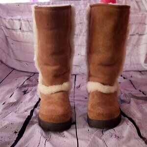 Brown tall Sunburst UGG with fur trim detail